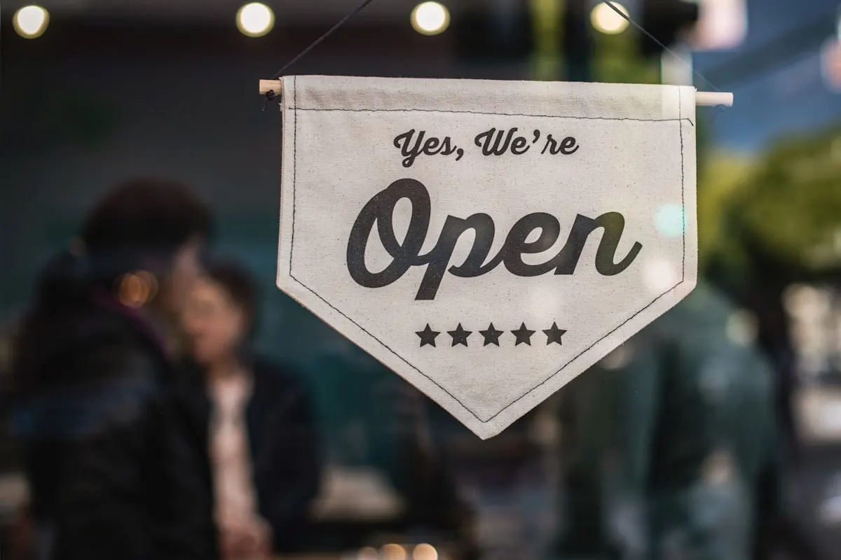 An illuminated open sign at a local business